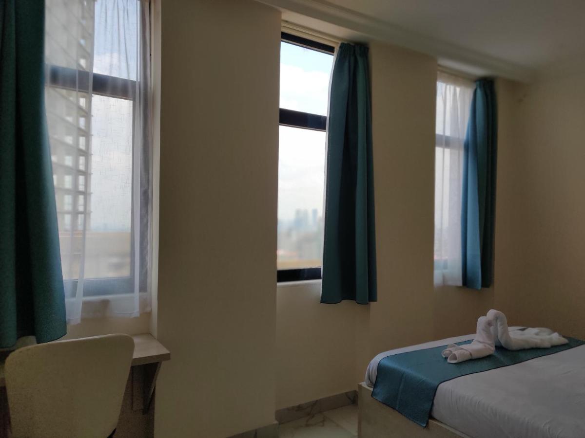 Glam Hotel Аддис-Абеба Экстерьер фото